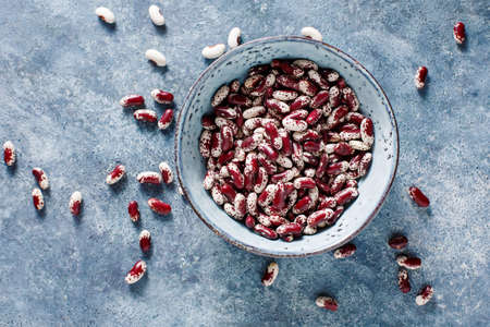 Red beans in a bowl, top view. Selective focus.の写真素材