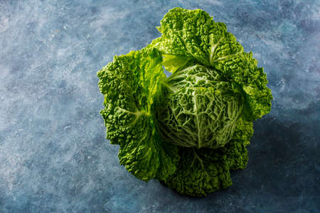 Raw savoy cabbage from the farm. Organic vegetables.