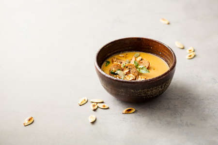 Pumpkin soup in a bowlの写真素材