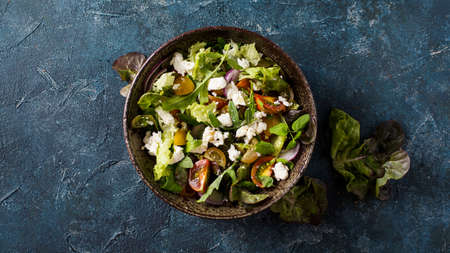 Homemade salad with cherry tomatoesの写真素材