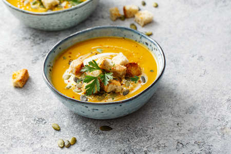 Spicy pumpkin soup with croutons. Healthy food.の写真素材