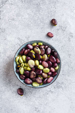 Raw organic broad beans in bowl. Healthy foodの写真素材