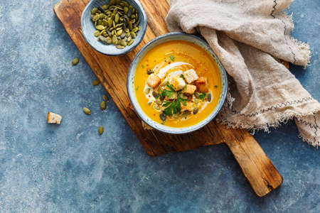 Spiced pumpkin, carrot, and sweet potato soup.の写真素材