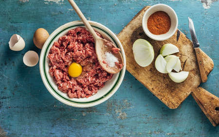 Mixed minced beef and pork for meatballs or cutlets. Cooking mince. Top view.の写真素材