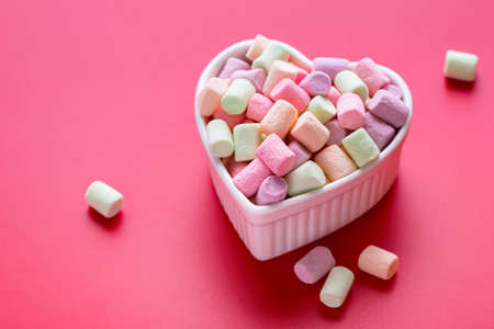 Colorful mini marshmallows in a bowl. Selective focusの写真素材