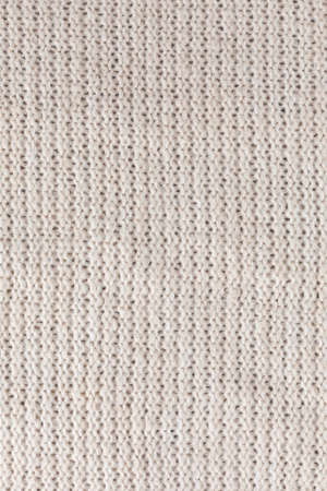 White knitted fabric close up. Copy space.の写真素材