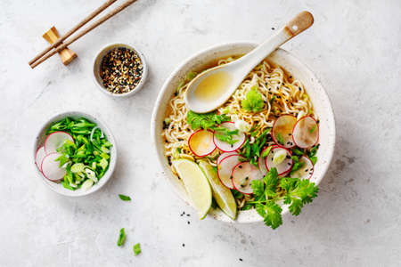 Bowls with Asian soup Ramenの写真素材