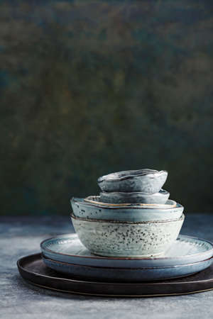 Tableware set on a green backgroundの写真素材