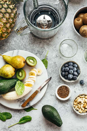 Process of making fruit smoothies, fruits and berries, food background.の写真素材