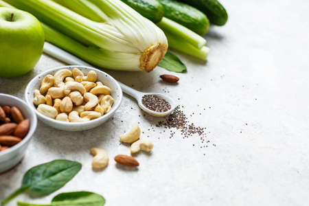 Healthy food. Green vegetables, nuts and Chia seeds.の写真素材