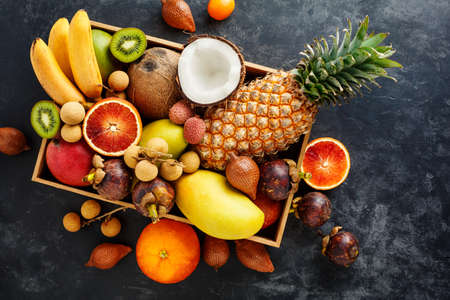 Fresh exotic fruit in a box.の写真素材