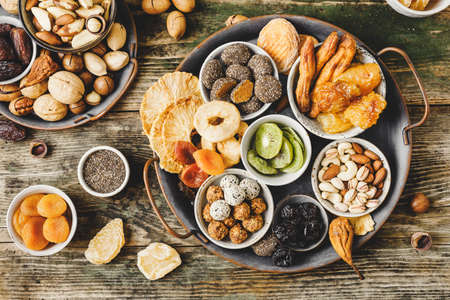 Various types of nuts and dried fruits without sugar.の写真素材