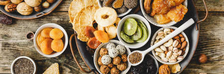 Homemade sweets from dried fruits without sugar and different nuts.の写真素材