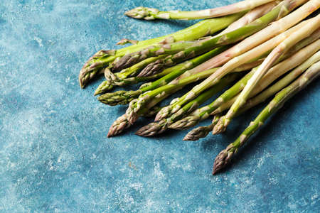 Fresh Asparagus on blue backgroundの写真素材