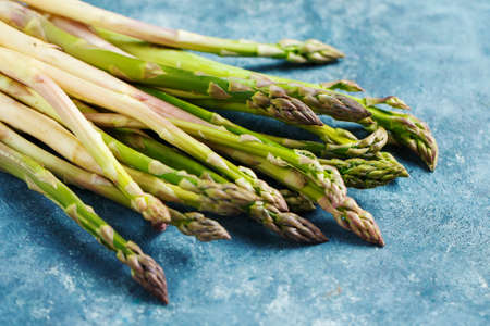 Colose-up bunch of fresh asparagusの写真素材