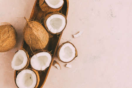 Fresh coconuts with coconut halvesの写真素材