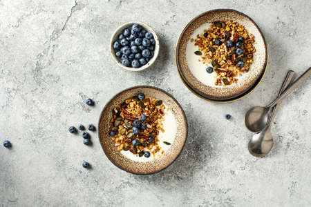 Homemade granola with yogurt and blueberryの写真素材