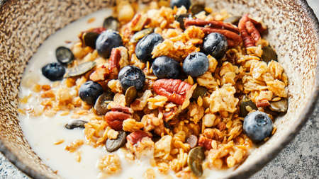 Homemade granola with yogurt and blueberry, Close up.