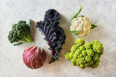 Cabbage of different varieties on a light background, cauliflower, radicchio, broccoli, Kale.の写真素材
