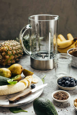 Making a healthy smoothie. Healthy clean breakfast.の写真素材