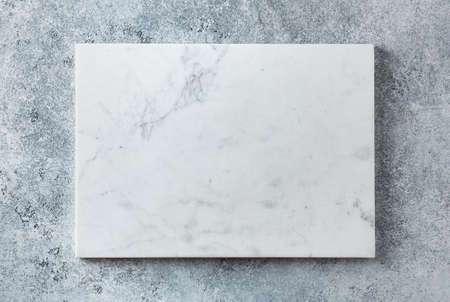 Gray serving tray made on a textured background. The view from the top. Copy spaceの写真素材