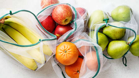 Fresh fruits, apples, bananas, pears and blood oranges.の写真素材