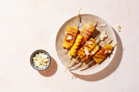 Grilled pineapple wedgesの写真素材