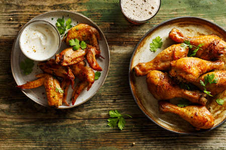 Baked chicken wings and drumstickの写真素材