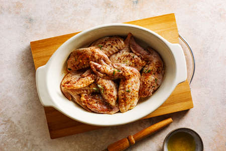 Raw marinated chickenの写真素材