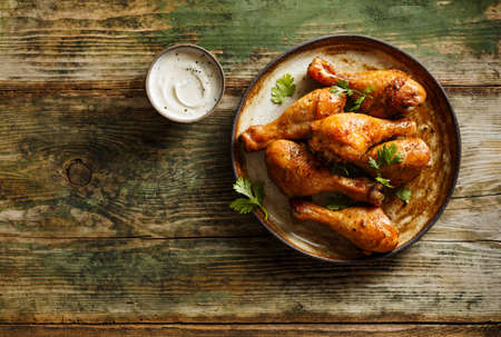 Baked chicken drumstickの写真素材