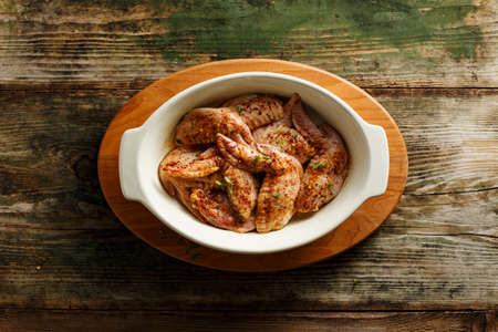 Raw marinated chickenの写真素材