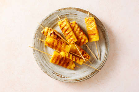 Grilled pineapple wedgesの写真素材