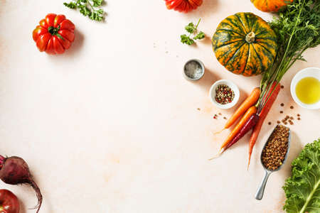 Fresh organic seasonal vegetables, carrots and pumpkin, onion. Ingredients for cooking.の写真素材