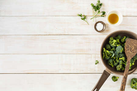 Organic broccoli in a frying pan.の写真素材