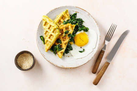 Warm waffles with spinach and cheese.の写真素材