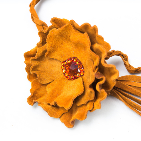 the decoration of leather. handmade on a white backgroundの写真素材
