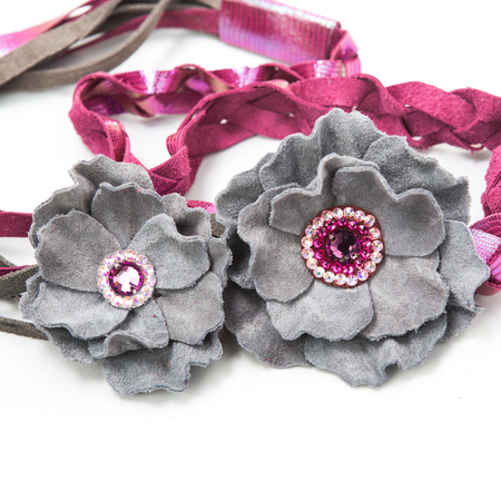 the decoration of leather. handmade on a white backgroundの写真素材
