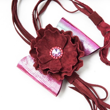 the decoration of leather. handmade on a white backgroundの写真素材