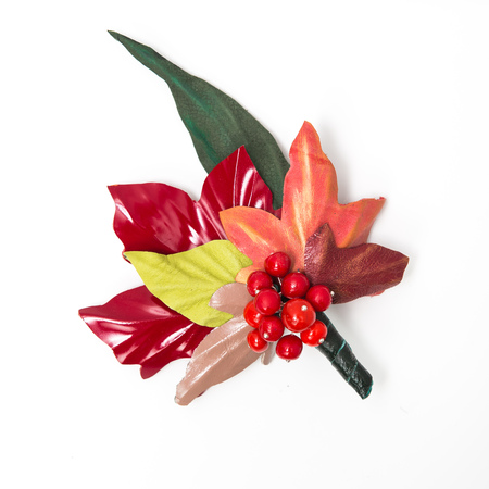 the decoration of leather. brooch in the shape of umbrella with flowers handmade on white backgroundの写真素材