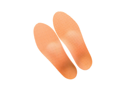 orthotics on a white background. Insert in shoes to support the foot