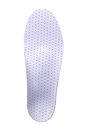 orthotics on a white background. Insert in shoes to support the footの写真素材