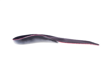 orthotics on a white background. Insert in shoes to support the footの写真素材