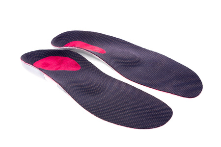 orthotics on a white background. Insert in shoes to support the footの写真素材