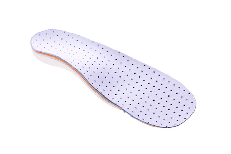 orthotics on a white background. Insert in shoes to support the footの写真素材