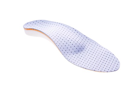orthotics on a white background. Insert in shoes to support the footの写真素材
