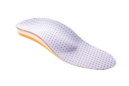 orthotics on a white background. Insert in shoes to support the footの写真素材