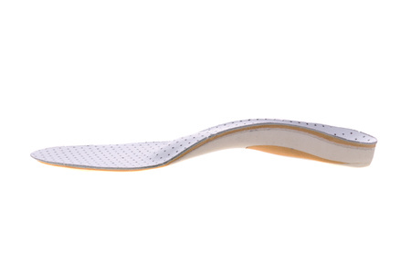 orthotics on a white background. Insert in shoes to support the footの写真素材