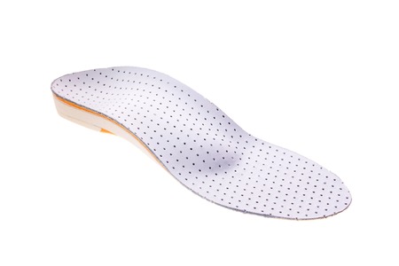 orthotics on a white background. Insert in shoes to support the footの写真素材