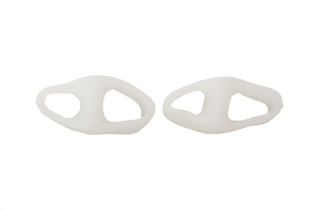 The orthopedic device is intended for the removal of the first finger. The product for the implementation of treatment-and-prophylactic correction with the effect of crisscross fingers. The interdigital insert is made of gel, easy and convenient to use.の写真素材