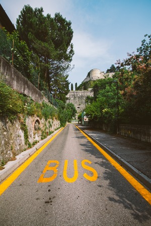 The bus for public transport of a yellow bus in Italy, Lombardy.の写真素材